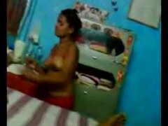 Obese Indian honey is ravaging her customer in front of a covert camera, in her apartment