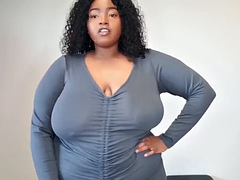 Chubby ebony shows how to lift her big boobs