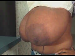 Biggest black boobs on earth - mom Cheron topless measuring huge bust