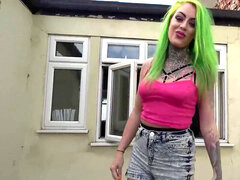 Green hair rebel Phoenix Madina labia playing outdoor