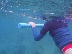 You snorkel at night and in the day with Ashley.