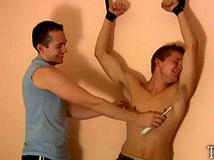 Young Muscular Dude kittled by petite lean Guy