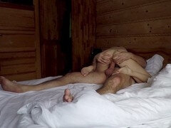 Intimate lovemaking in a hotel room leads to a satisfying creampie