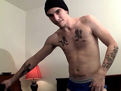 tattooed homosexual thug plays with his enormous shaft solo