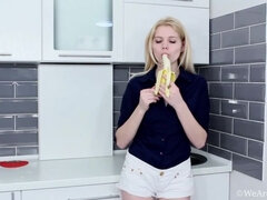 Amusa plays in her kitchen with a banana and more