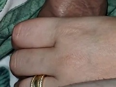 Stepmom handjob under the blanket makes her stepsons cock hard as a rock