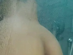 Fat latina fucks herself in the shower