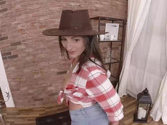 Babe in a cowboy hat Nicolette Noir rubbing her cunt on camera
