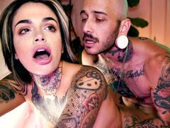 Inked girlfriend licking trans before strapon sex
