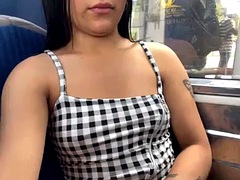Latina masturbates and squirts on the bus